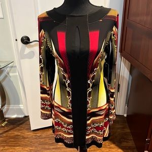 Party Dress with peel-a-boo front and back slit.